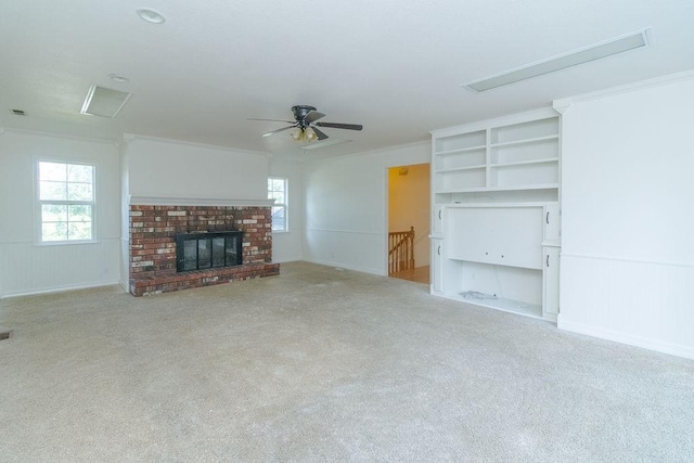 1103 NW 10th St, Bentonville, AR 72712 - unfurnished living room featuring carpet, healthy amount of natural light, and ceiling fan