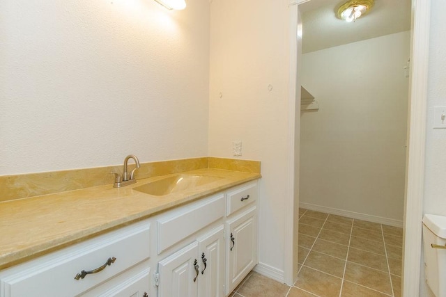 1103 NW 10th St, Bentonville, AR 72712 - bathroom featuring vanity and tile patterned floors