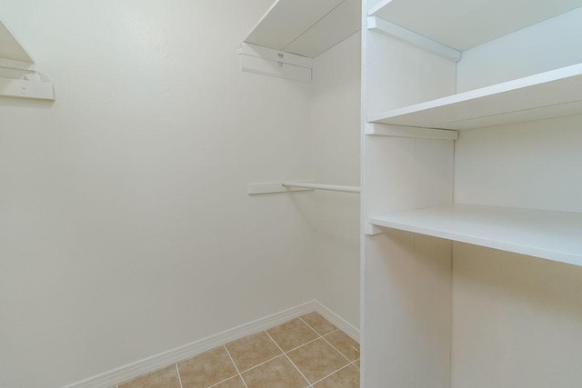 1103 NW 10th St, Bentonville, AR 72712 - spacious closet with light tile patterned flooring