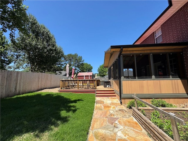 904 Deerfield Ct, Russellville, AR 72801 - view of yard featuring a sunroom and a wooden deck