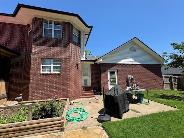 904 Deerfield Ct, Russellville, AR 72801 - back of house with brick siding, a patio, and entry steps