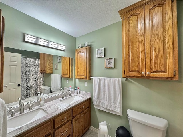 904 Deerfield Ct, Russellville, AR 72801 - full bathroom with toilet, double vanity, a textured ceiling, baseboards, and a shower with curtain