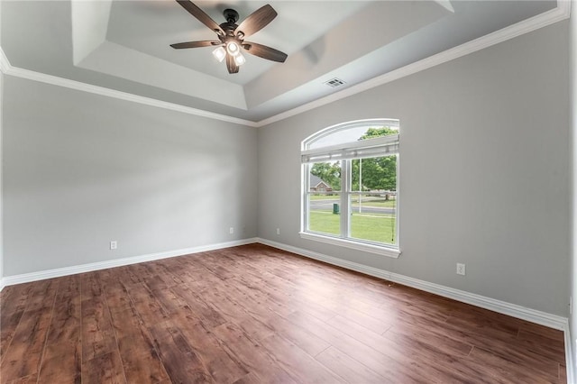 602 SW Brighton Dr, Bentonville, AR 72712 - unfurnished room featuring a tray ceiling, dark wood finished floors, a ceiling fan, baseboards, and crown molding
