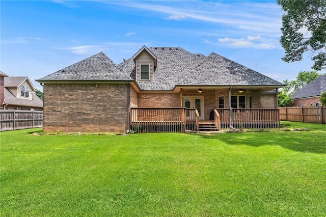 602 SW Brighton Dr, Bentonville, AR 72712 - back of property with brick siding, a wooden deck, a shingled roof, and ceiling fan