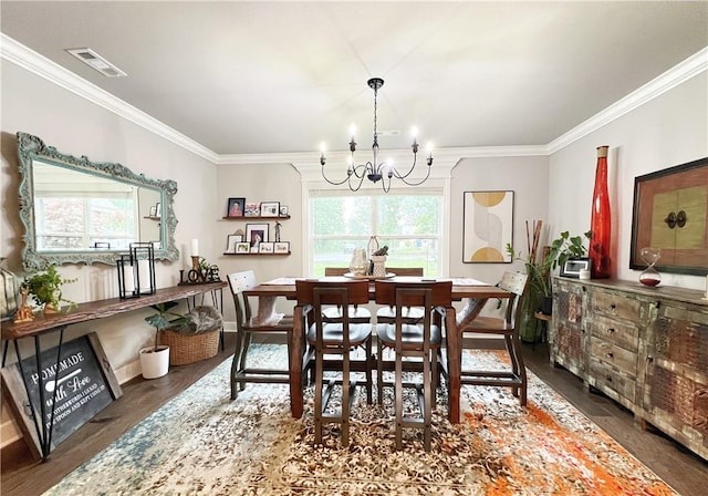 219 Kinross Dr, Bella Vista, AR 72715 - dining area featuring a chandelier, crown molding, and wood finished floors