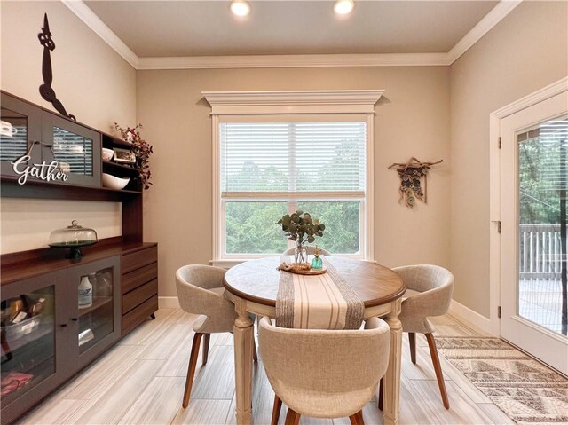 219 Kinross Dr, Bella Vista, AR 72715 - dining space featuring crown molding, baseboards, and recessed lighting