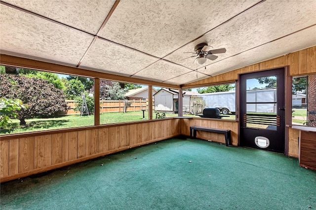 2001 W Magnolia St, Rogers, AR 72758 - unfurnished sunroom with vaulted ceiling and a ceiling fan