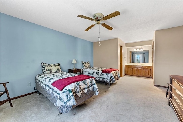 2001 W Magnolia St, Rogers, AR 72758 - bedroom featuring light colored carpet, baseboards, ensuite bath, and ceiling fan