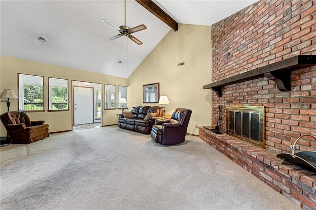 2001 W Magnolia St, Rogers, AR 72758 - living area with carpet flooring, a ceiling fan, high vaulted ceiling, a fireplace, and beam ceiling