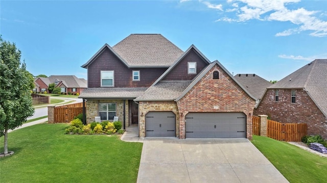 6401 S 47th St, Rogers, AR 72758 - view of front of house with concrete driveway, a shingled roof, a garage, and brick siding