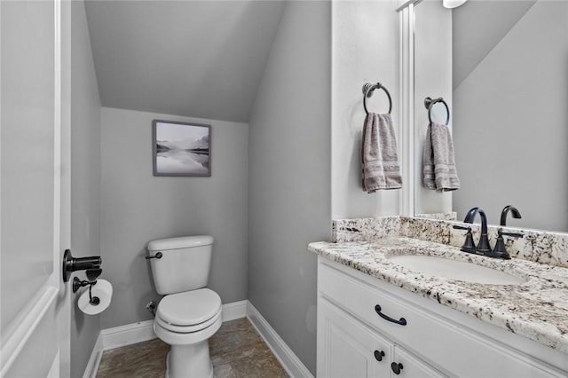6401 S 47th St, Rogers, AR 72758 - half bathroom featuring vaulted ceiling, vanity, toilet, and baseboards