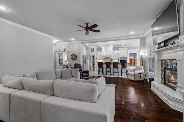 6401 S 47th St, Rogers, AR 72758 - living area featuring ceiling fan, crown molding, a fireplace, recessed lighting, and dark wood finished floors