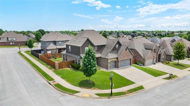 6401 S 47th St, Rogers, AR 72758 - view of front of property featuring a residential view, driveway, a garage, and brick siding