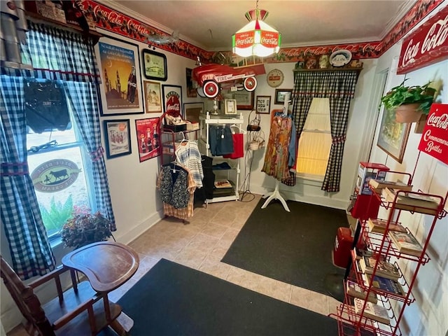 273 N Main St, Eureka Springs, AR 72632 - exercise room featuring crown molding, tile patterned flooring, and baseboards