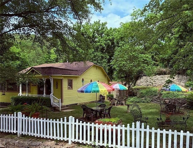 273 N Main St, Eureka Springs, AR 72632 - view of front of house with a shingled roof