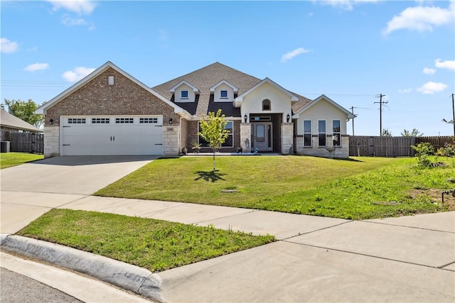 2300 Cameo Ln, Bentonville, AR 72712 - view of front facade with a garage, concrete driveway, stone siding, and stucco siding
