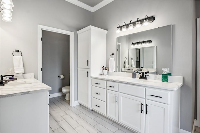 2300 Cameo Ln, Bentonville, AR 72712 - full bath featuring vanity, toilet, crown molding, and baseboards