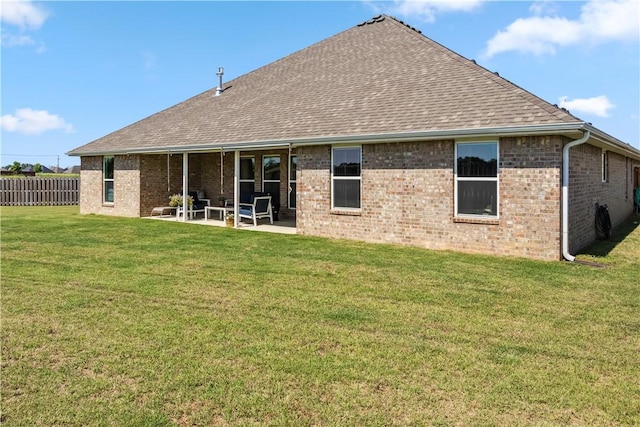 2300 Cameo Ln, Bentonville, AR 72712 - back of property with roof with shingles, a patio, and brick siding