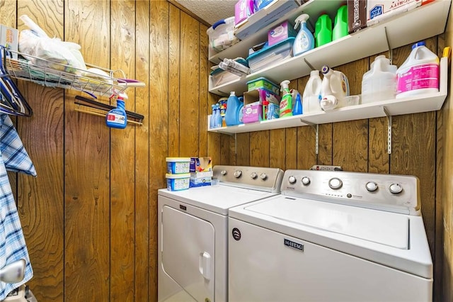 521 S 13th St, Rogers, AR 72758 - laundry area featuring wood walls and washing machine and clothes dryer