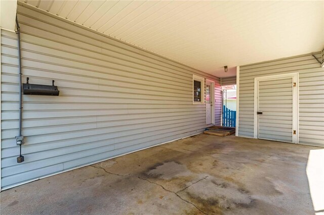 521 S 13th St, Rogers, AR 72758 - view of patio featuring a carport