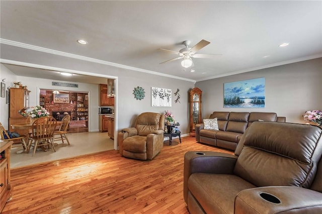 521 S 13th St, Rogers, AR 72758 - living room with ornamental molding, light wood-style flooring, ceiling fan, recessed lighting, and baseboards
