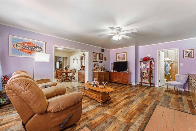 521 S 13th St, Rogers, AR 72758 - living room featuring ceiling fan, wood-type flooring, and ornamental molding