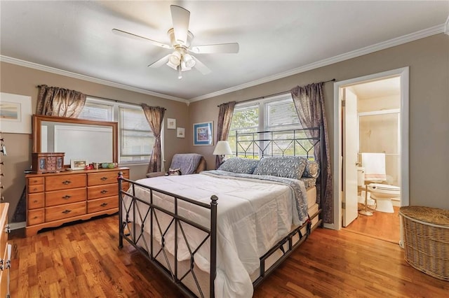 521 S 13th St, Rogers, AR 72758 - bedroom featuring wood finished floors, crown molding, ensuite bathroom, and a ceiling fan