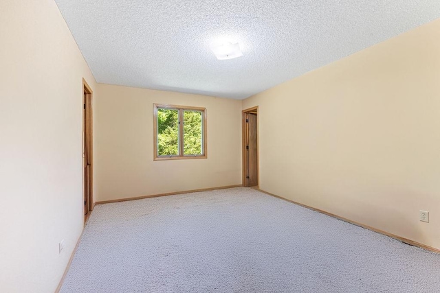4 Wincanton Ln, Bella Vista, AR 72715 - unfurnished room featuring a textured ceiling, light carpet, and baseboards