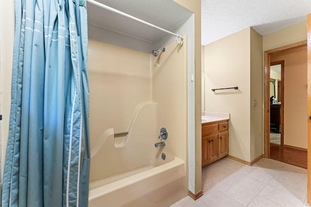 4 Wincanton Ln, Bella Vista, AR 72715 - full bath with shower / tub combo with curtain, tile patterned floors, vanity, baseboards, and a textured ceiling