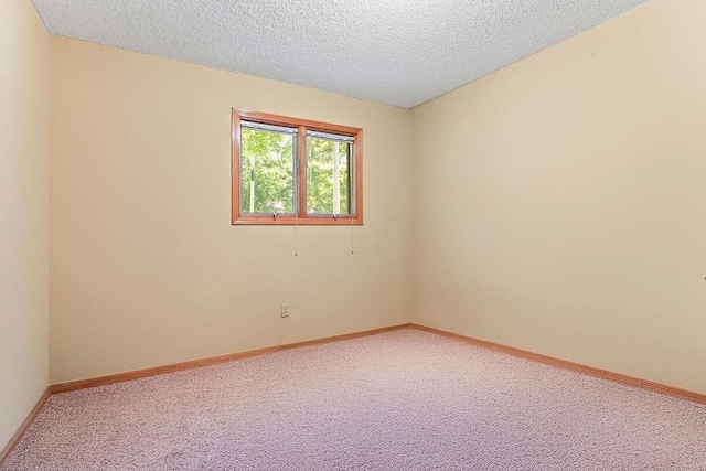 4 Wincanton Ln, Bella Vista, AR 72715 - empty room with light colored carpet, a textured ceiling, and baseboards