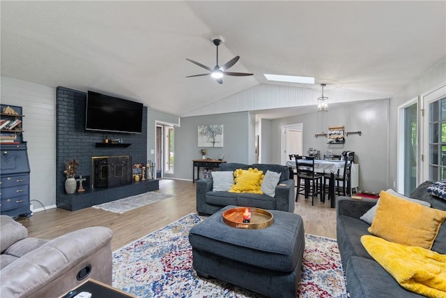 3 Summit Dr, Holiday Island, AR 72631 - living room with a ceiling fan, healthy amount of natural light, wood finished floors, and vaulted ceiling