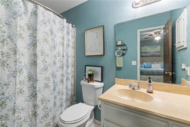 81 Overton Dr, Bella Vista, AR 72714 - ensuite bathroom with toilet, vanity, a textured wall, and a shower with curtain