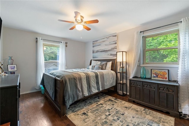 81 Overton Dr, Bella Vista, AR 72714 - bedroom featuring dark wood finished floors, a ceiling fan, and baseboards