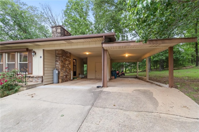 81 Overton Dr, Bella Vista, AR 72714 - view of home's community featuring driveway and a carport
