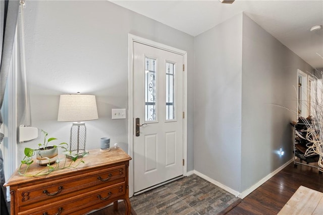 81 Overton Dr, Bella Vista, AR 72714 - foyer entrance with baseboards and dark wood finished floors