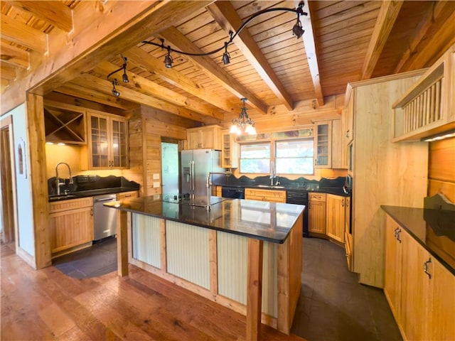 463 County Road 2281, Eureka Springs, AR 72631 - kitchen with black appliances, wooden ceiling with exposed beams, dark countertops, rail lighting, and a kitchen island