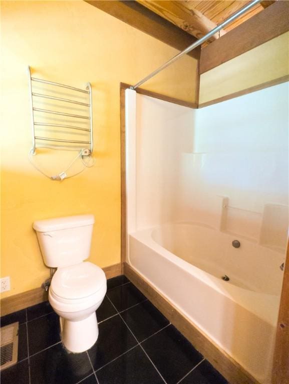 463 County Road 2281, Eureka Springs, AR 72631 - bathroom featuring toilet, a towel warmer, tile patterned flooring, bathing tub / shower combination, and baseboards