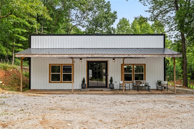 18097 Clear Water Rd, Fayetteville, AR 72704 - back of house featuring covered porch