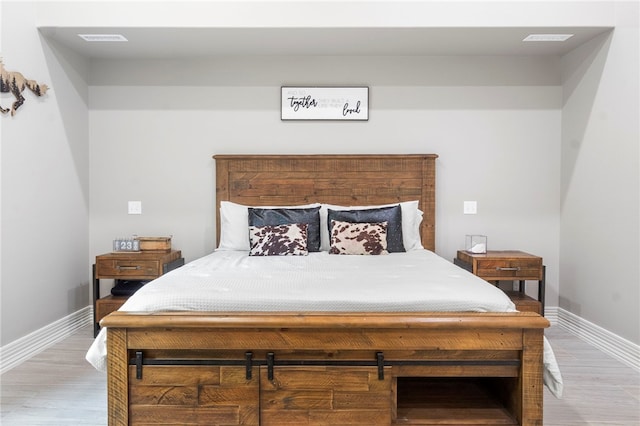 18097 Clear Water Rd, Fayetteville, AR 72704 - bedroom with wood finished floors and baseboards