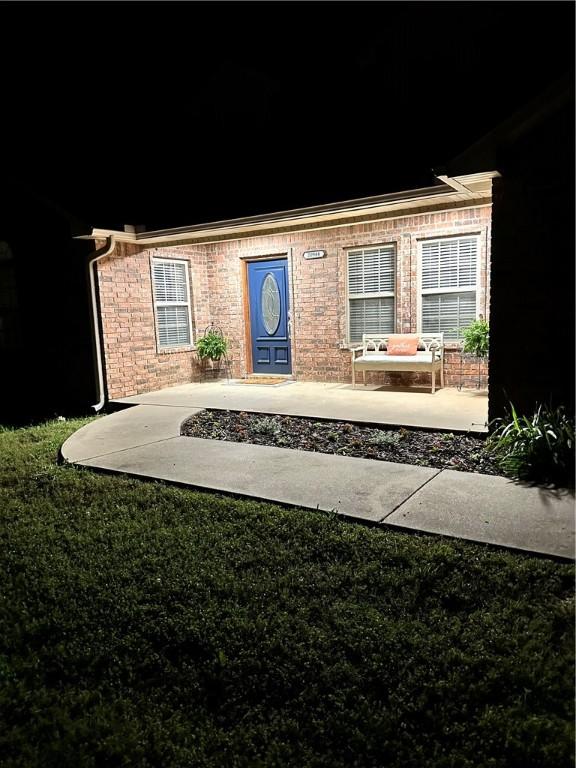 20944 Shady Grove Rd, Siloam Springs, AR 72761 - view of exterior entry with brick siding