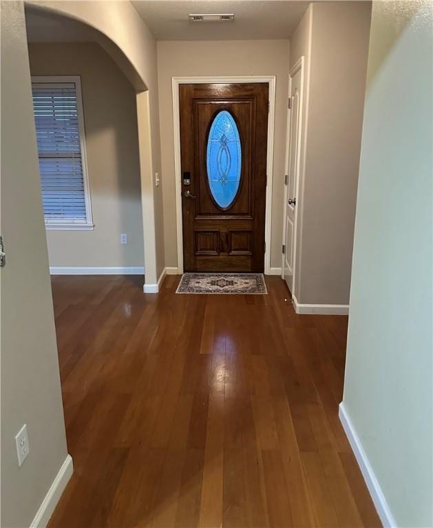 20944 Shady Grove Rd, Siloam Springs, AR 72761 - entryway featuring wood-type flooring, arched walkways, and baseboards