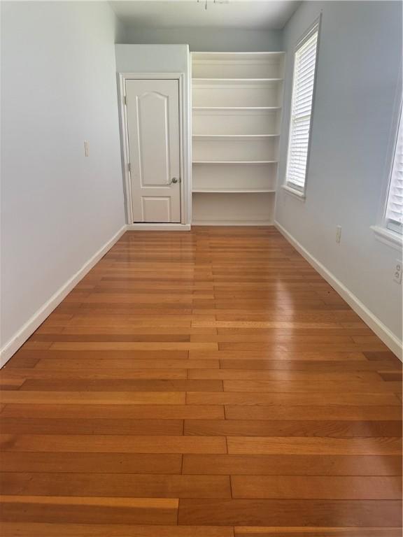 20944 Shady Grove Rd, Siloam Springs, AR 72761 - spare room with light wood finished floors and baseboards