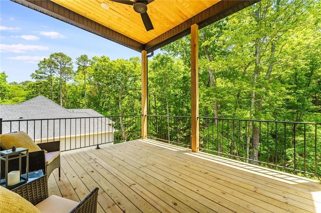 41 Westmorland Dr, Bella Vista, AR 72714 - wooden deck with ceiling fan and a forest view