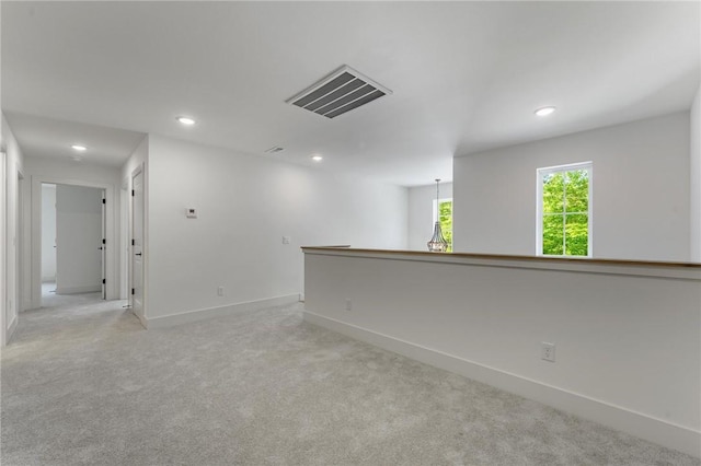 41 Westmorland Dr, Bella Vista, AR 72714 - spare room featuring baseboards, light carpet, and recessed lighting