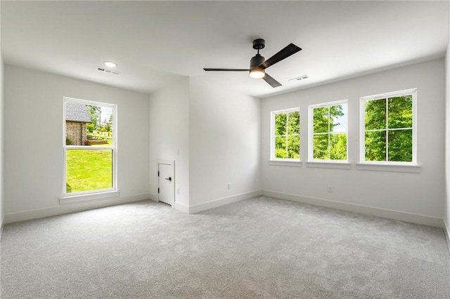 41 Westmorland Dr, Bella Vista, AR 72714 - carpeted spare room with baseboards and a ceiling fan