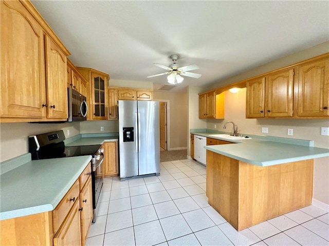 4671 Bailey Cir, Springdale, AR 72762 - kitchen with appliances with stainless steel finishes, a peninsula, a ceiling fan, light tile patterned floors, and a sink