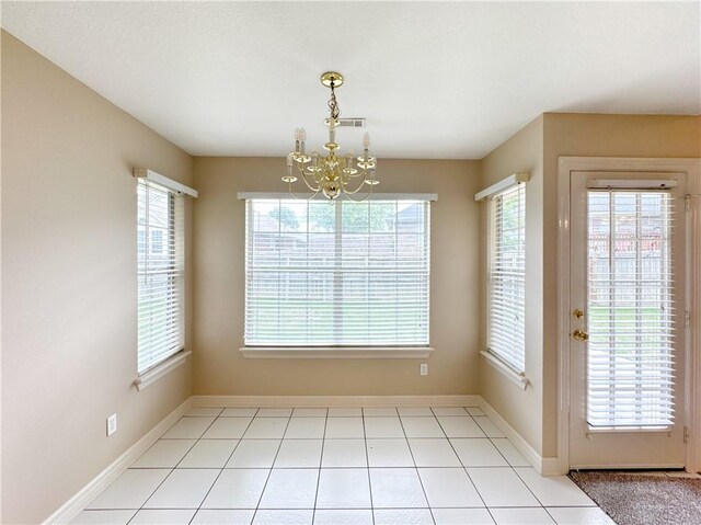 4671 Bailey Cir, Springdale, AR 72762 - unfurnished dining area featuring a chandelier and baseboards