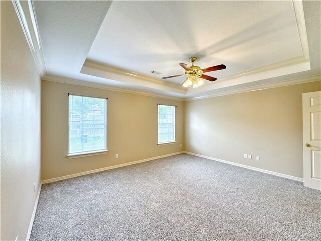 4671 Bailey Cir, Springdale, AR 72762 - carpeted spare room featuring a raised ceiling, crown molding, ceiling fan, and baseboards