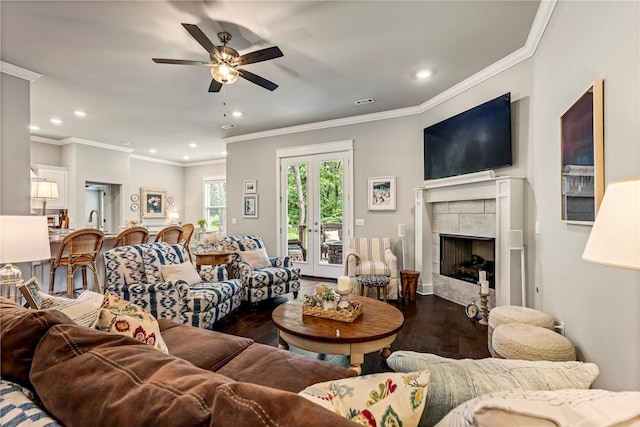13 Ingleborough Dr, Bella Vista, AR 72715 - living room with recessed lighting, wood finished floors, a fireplace, ornamental molding, and a ceiling fan