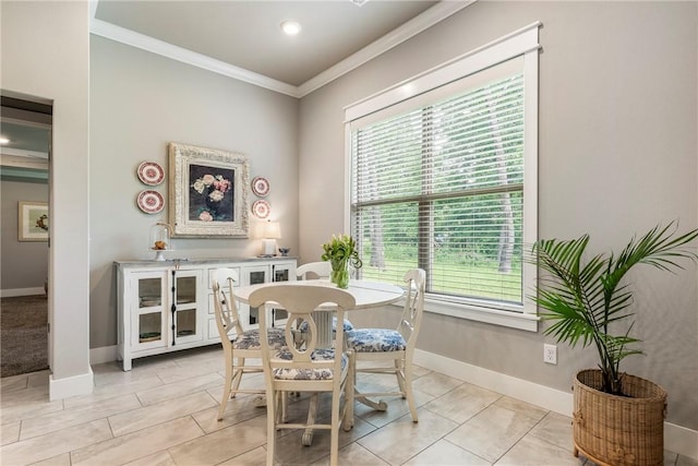 13 Ingleborough Dr, Bella Vista, AR 72715 - dining space with plenty of natural light, crown molding, and baseboards